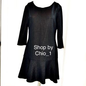 Eien black textured dress with drop-waist silhouette. 3/4 length sleeves